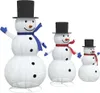 Three decorative snowmen of varying sizes, all wearing black top hats and scarves, are displayed against a white background. Náhled obrázku produktu