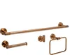 A set of copper-colored bathroom accessories displayed against a white background. Anteprima dell’immagine prodotto