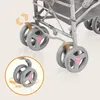 Close-up of the wheels of a baby stroller, highlighting their 360-degree rotation. Produktbild-Vorschau