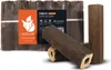 A product shot of wood briquettes with packaging and some individual briquettes in the foreground. Produktbild-Vorschau