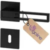 A black door handle set with a keyhole escutcheon and a product tag. Produktbild-Vorschau