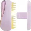A close-up, side view of a Tangle Teezer hairbrush and its cover, set against a white background. Produktbild-Vorschau