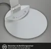 Close-up of the base and control panel of a silver LED desk lamp. Produktbild-Vorschau