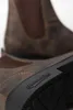 Close-up of the sole and heel of a brown leather boot. Produktbild-Vorschau
