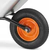 Close-up of a wheel and part of the body of a wheelbarrow. Podgląd zdjęcia produktu