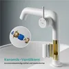 A white faucet with a cutaway view showing its internal components and text describing its features. Produktbild-Vorschau