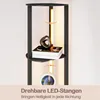 A corner shelf unit with integrated LED lighting, displaying books and a decorative object. Podgląd zdjęcia produktu