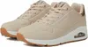 A pair of beige Skechers sneakers are shown from a side angle against a white background. Produktbild-Vorschau