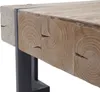 Close-up of a wooden table with metal legs. Voir les images du produit