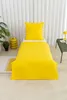 A yellow duvet cover and pillow set laid out on a bed. Podgląd zdjęcia produktu