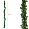 A green Christmas garland with lights is shown against a white background, with a measurement indicator. Anteprima dell’immagine prodotto