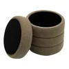 A stack of four round storage stools with a textured brown exterior and a black interior. Produktbild-Vorschau