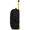 A side view of a black rolling suitcase with a white and gold polka dot pattern, set against a white background. Produktbild-Vorschau