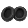 Two black headphone ear pads are shown on a white background. Anteprima dell’immagine prodotto