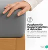 A hand is shown touching a gray fitted sheet on a wooden bed frame, with marketing text and icons overlaid. Náhľad obrázku produktu