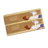 Two gold-wrapped chocolate bars stacked on a white background. Anteprima dell’immagine prodotto