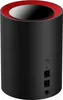 A black cylindrical router with a red and silver top, shown from the back with ports visible. Náhled obrázku produktu