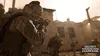 Soldiers in combat gear in a war-torn urban environment. Produktbild-Vorschau