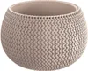A close-up studio shot of a round, knitted-texture plant pot. Anteprima dell’immagine prodotto