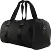 A black duffel bag with black straps and leather accents, shown against a white background. Produktbild-Vorschau