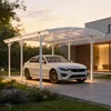 A white car is parked under a modern white carport in front of a house at dusk. Produktbild-Vorschau