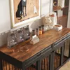 A dog crate and accessories are displayed on a wooden table. Produktbild-Vorschau