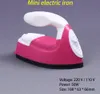 A pink and white mini electric iron is displayed against a gray background, with product specifications shown in text at the bottom right. Produktbild-Vorschau
