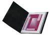 An open black binder with a colorful geometric design on a white page inside. Anteprima dell’immagine prodotto