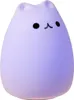 A purple cat-shaped night light. Produktbild-Vorschau