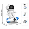 An astronaut figurine on a rocket, with dimensions indicated. Náhled obrázku produktu