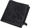A black grill cover folded and lying on a white surface. Produktbild-Vorschau