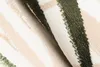 A close-up view of a textured rug with a striped pattern. Náhľad obrázku produktu