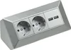 A silver-colored power strip with two standard electrical outlets and two USB ports, angled slightly. Anteprima dell’immagine prodotto