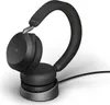 A black Jabra Evolve2 75 headset is shown resting on its charging dock against a white background. Náhled obrázku produktu