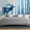 Vlies Fototapete - Winter animals - deer motif on a forest Produktbild-Vorschau 2