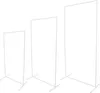 Three white metal stands of varying heights against a white background. Voir les images du produit