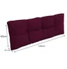 A long, tufted cushion in a deep violet color, shown from a diagonal angle with dimensions indicated. Voir les images du produit