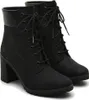 A pair of black Timberland heeled boots. Podgląd zdjęcia produktu