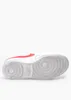 The underside of a white Nike sneaker with red accents. Produktbild-Vorschau