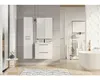 A modern bathroom with white vanity, tall cabinet, and a bathtub. Náhľad obrázku produktu