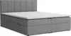 A grey upholstered boxspring bed with a white mattress topper. Voir les images du produit