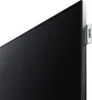 A close-up, angled view of the side of a black television screen with a silver frame. A small, white tag with the brand name 'LOEWE.' printed in black is attached to the side of the frame. Produktbild-Vorschau