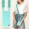 A woman wearing a white t-shirt and denim skirt is shown with a turquoise phone case attached to a turquoise lanyard around her neck. Náhled obrázku produktu