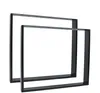 Two black metal table legs are shown against a white background. Podgląd zdjęcia produktu