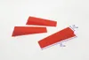 Three red leveling wedges are arranged on a white background, with dimensions indicated by blue lines and text. Produktbild-Vorschau