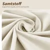 A close-up view of a soft, beige fabric, likely velvet, with text overlay describing its texture and quality. Produktbild-Vorschau
