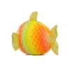 A plush toy fish with rainbow colors and gold fins, isolated on a white background. Produktbild-Vorschau