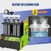 A fuel injector cleaning machine with a close-up inset showing a tank of cleaning fluid being heated. Náhled obrázku produktu
