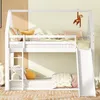 A white bunk bed with a slide and ladder, decorated with pillows and a hanging monkey toy. Anteprima dell’immagine prodotto