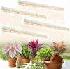 Four LED grow lights are shown above a collection of potted plants and gardening tools. Náhľad obrázku produktu